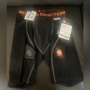 - Adidas hockey shorts with Velcro